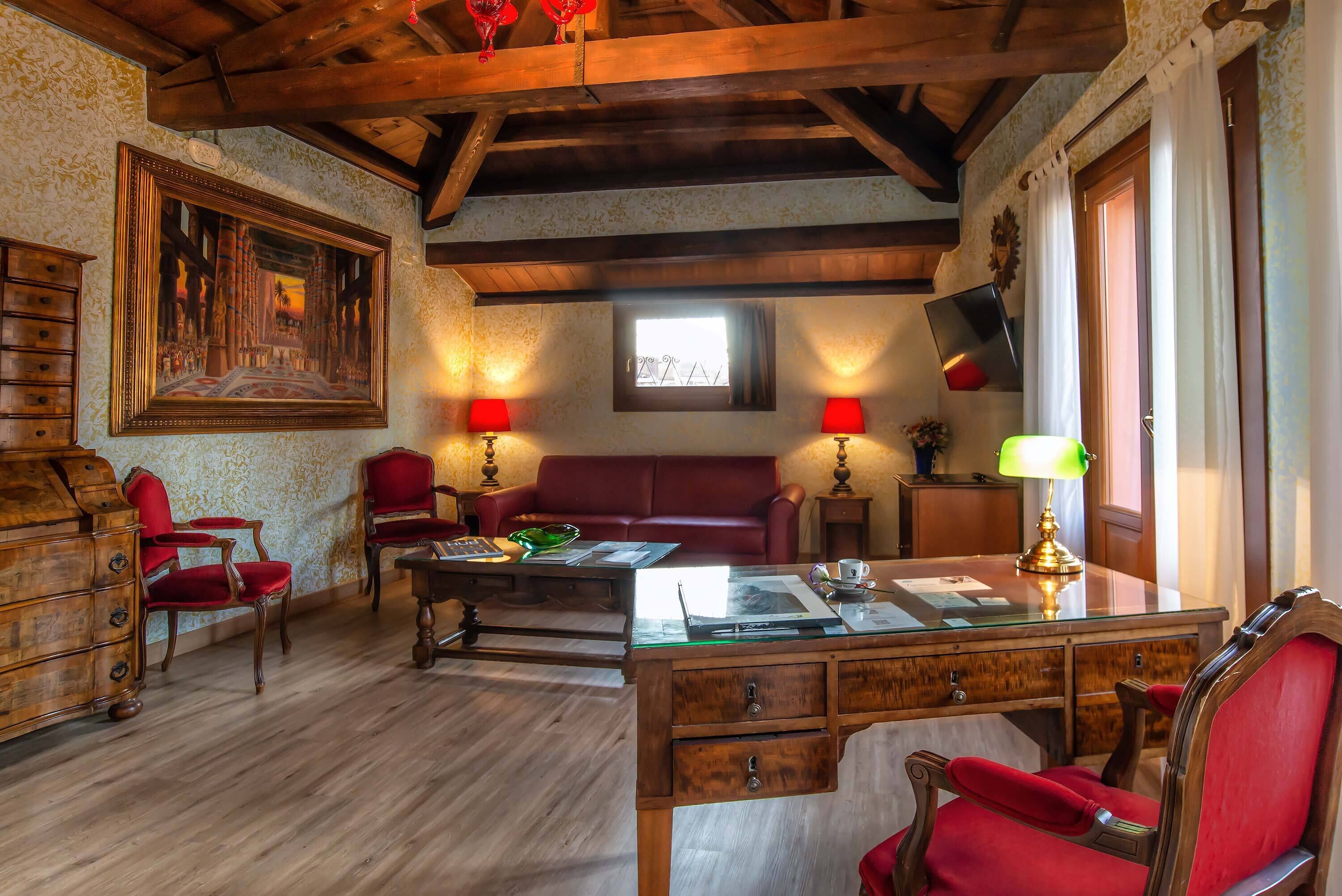 family suite, terrace | living area | flat-screen tv