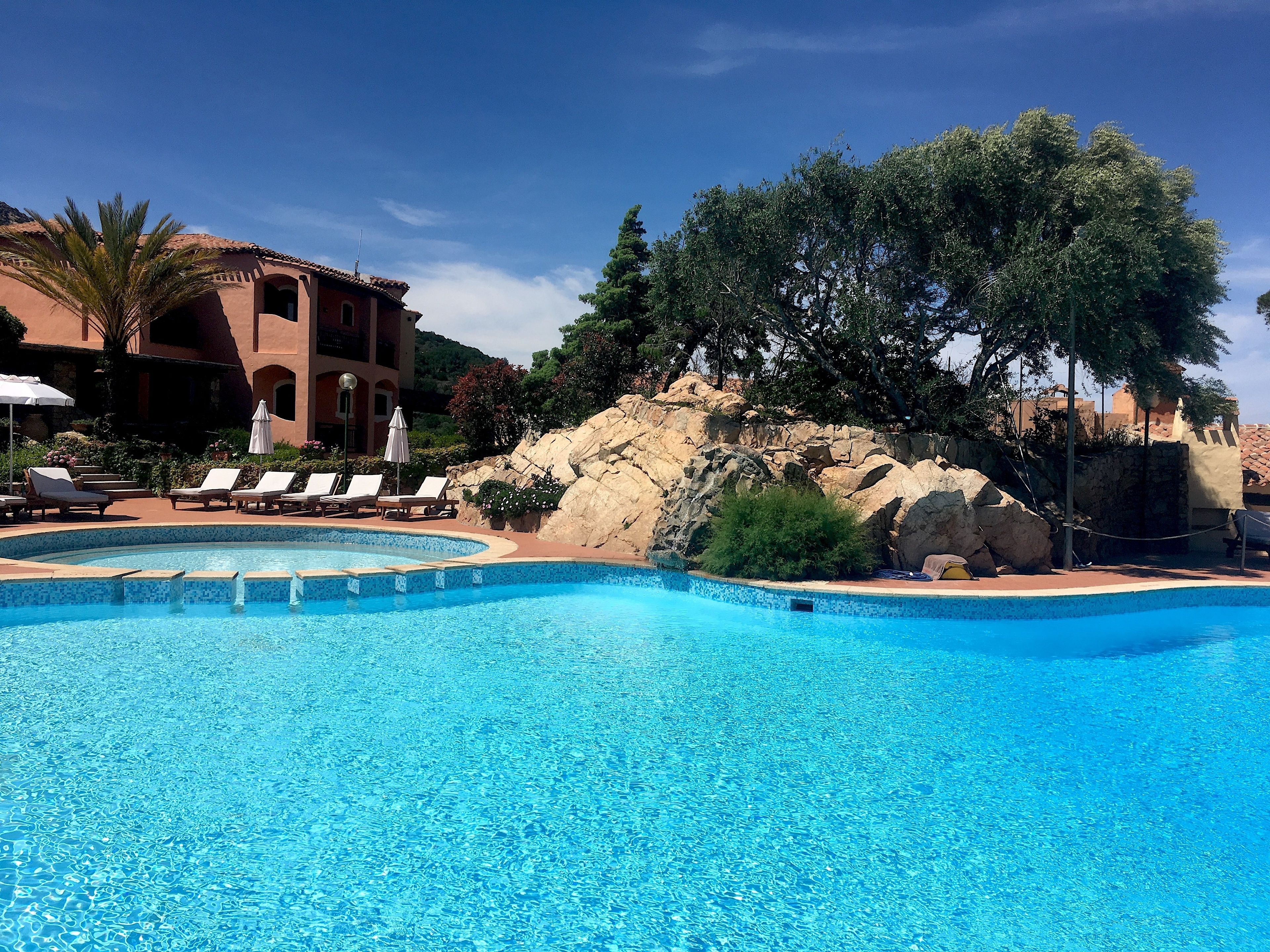 Outdoor pool, open 9:00 AM to 7 PM, pool umbrellas, sun loungers