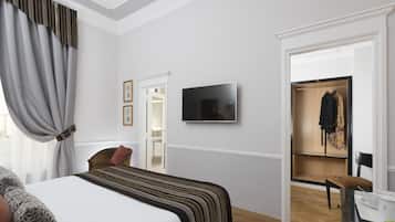 Une chambre d’hôtel avec un lit, une télévision, une armoire et une chaise.
