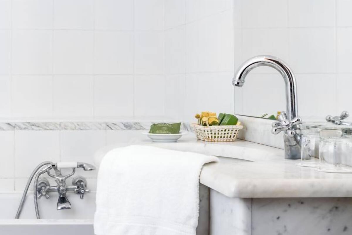 Bathroom | Hair dryer, slippers, towels, soap