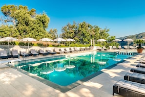 Seasonal outdoor pool, pool umbrellas, pool loungers