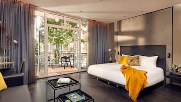 Suite junior, 1 cama de matrimonio grande | Caja fuerte, escritorio, sistema de insonorización
