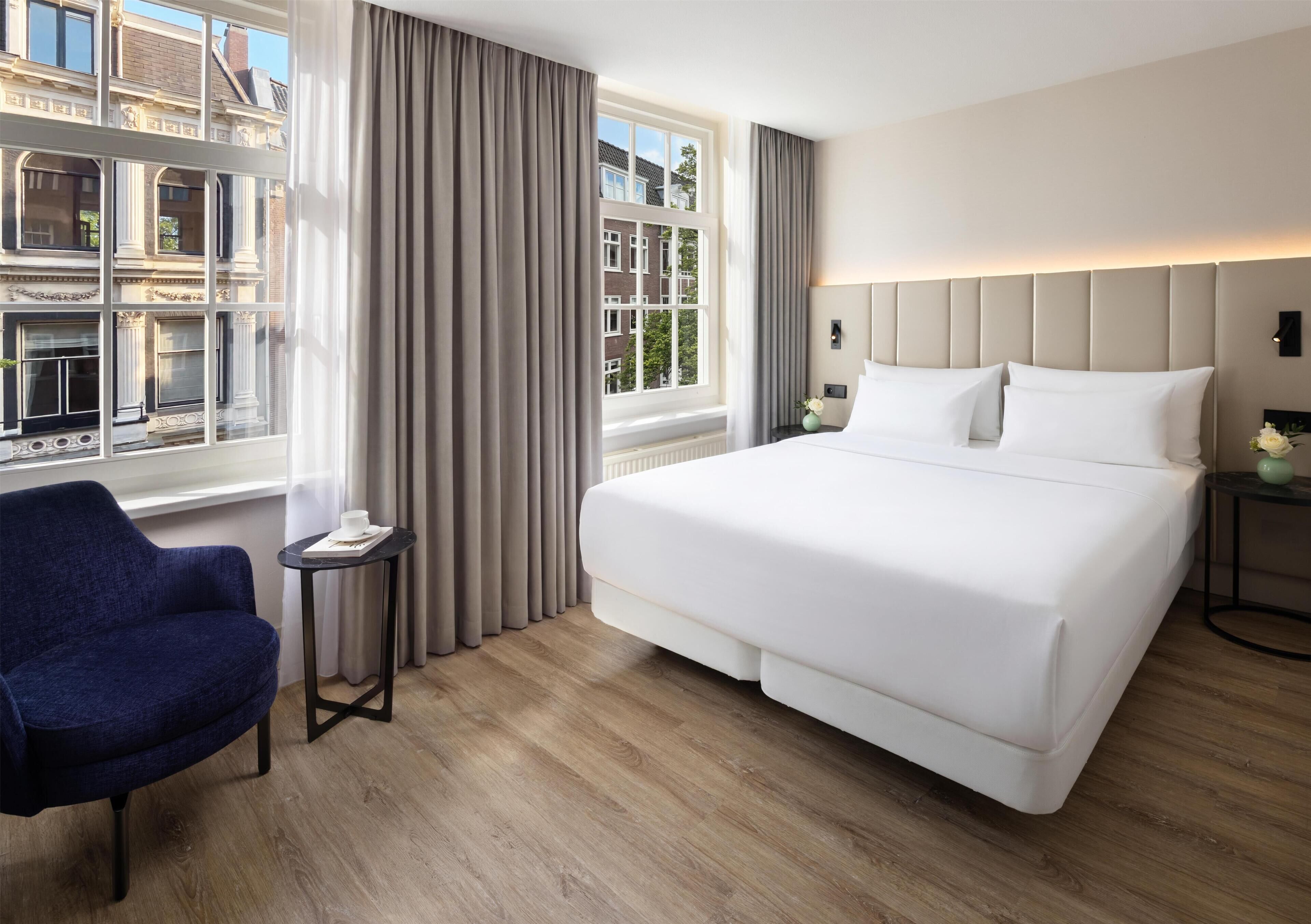 Standard Room (Street View) | Minibar, in-room safe, desk, blackout drapes
