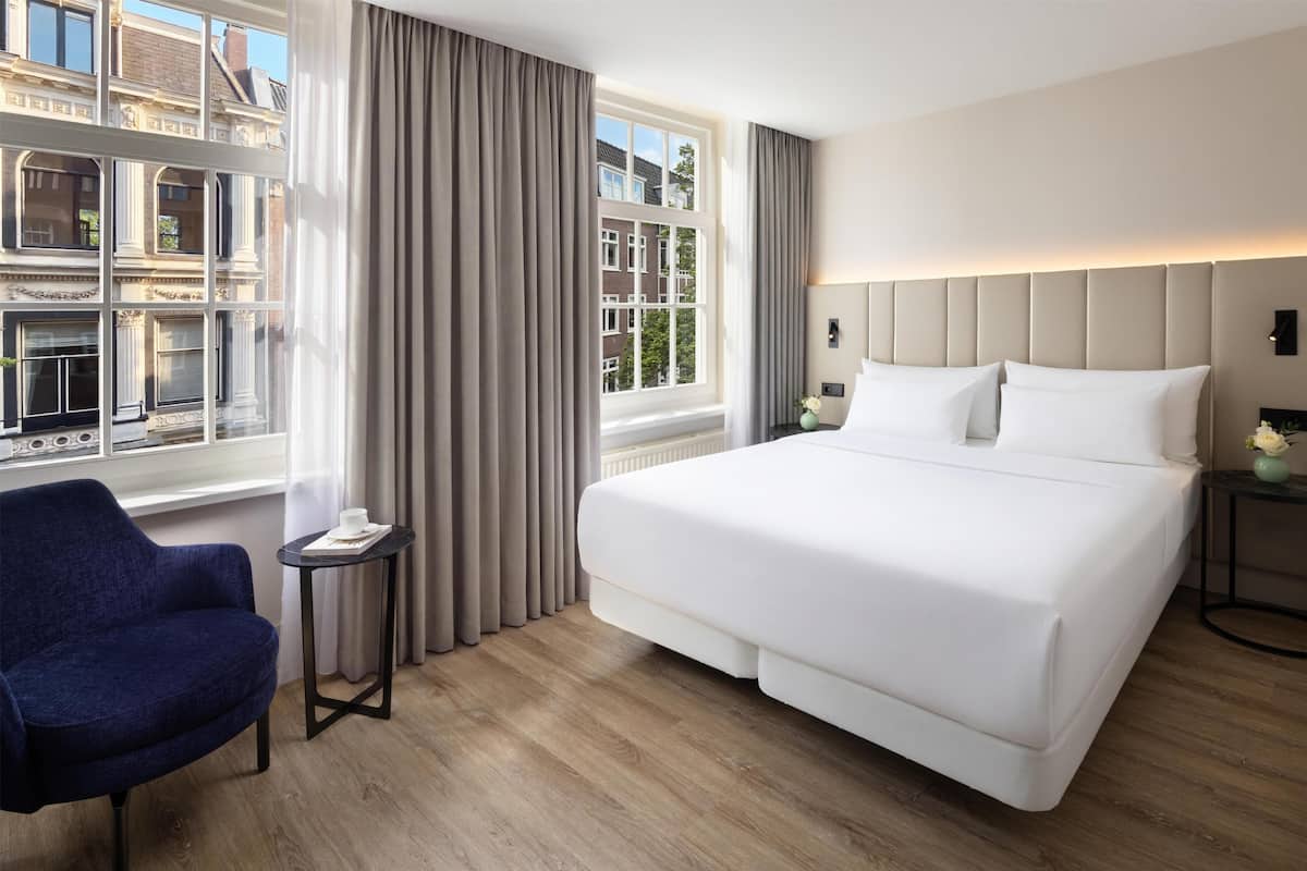 Standard Room (Street View) | Minibar, in-room safe, desk, blackout drapes