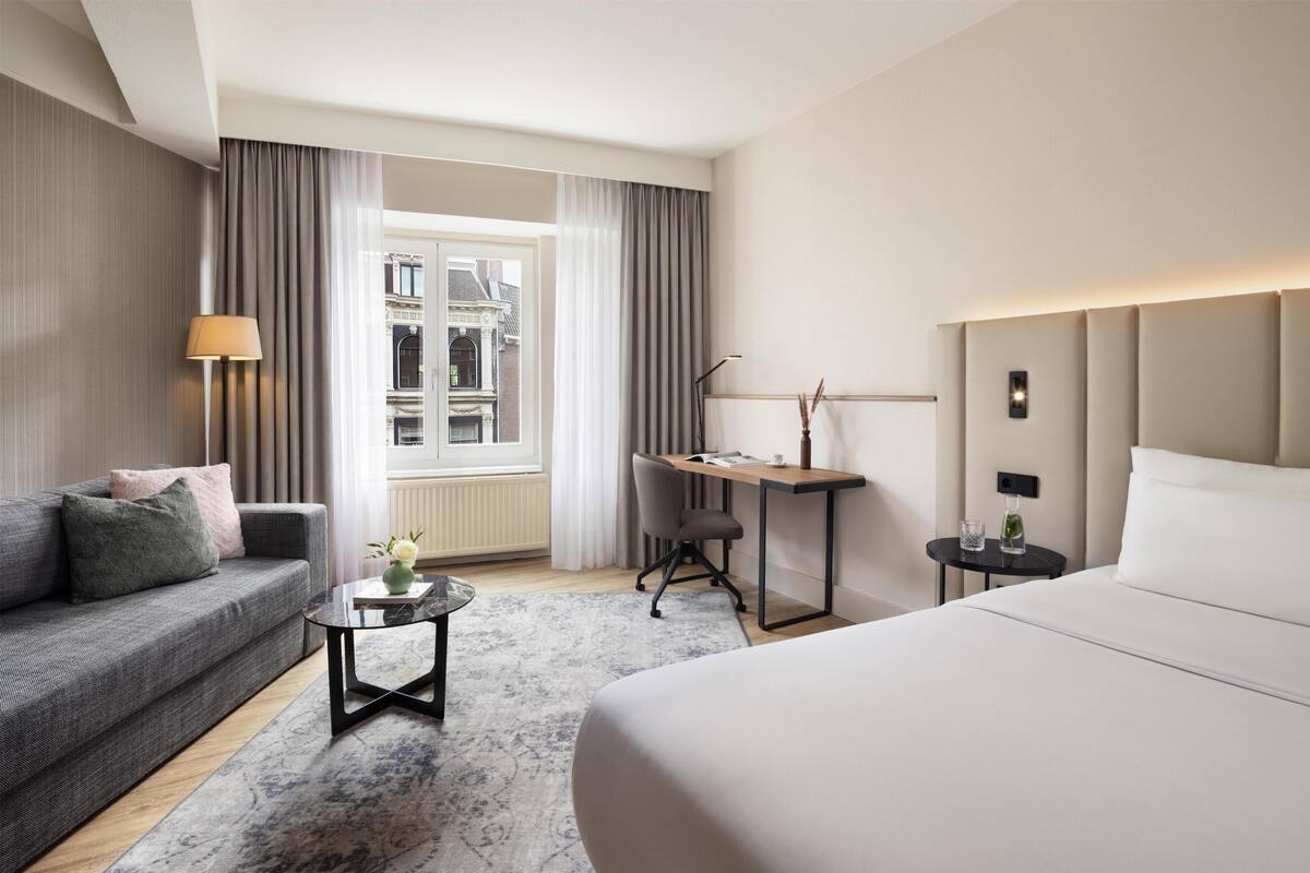 Superior Room (Street View) | Minibar, in-room safe, desk, blackout drapes