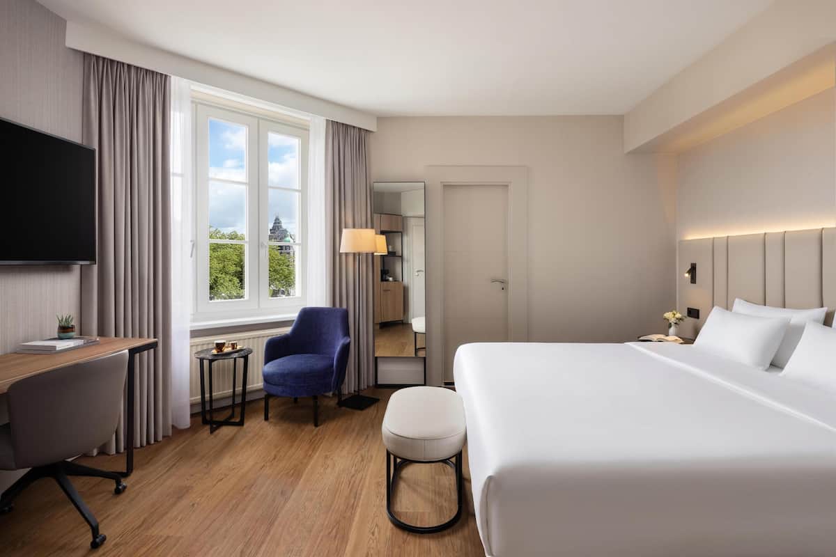 Superior Room, City View | Minibar, in-room safe, desk, blackout drapes