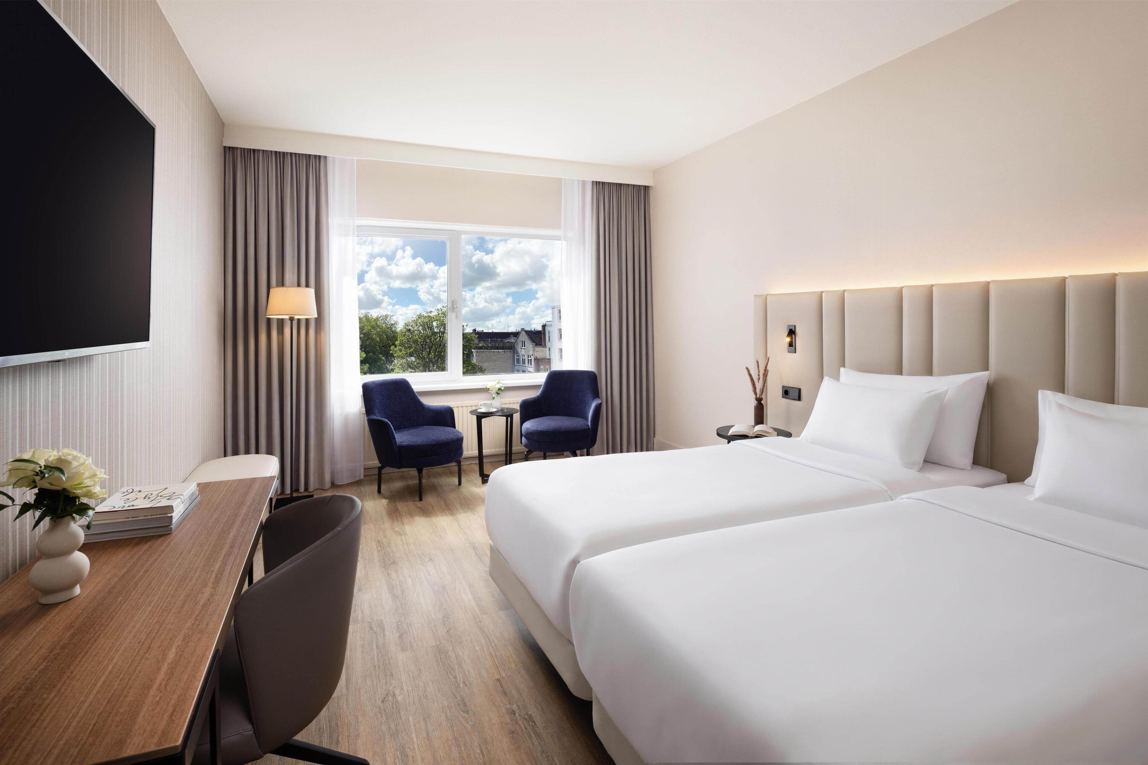 Standard Room (Courtyard) | Minibar, in-room safe, desk, blackout drapes