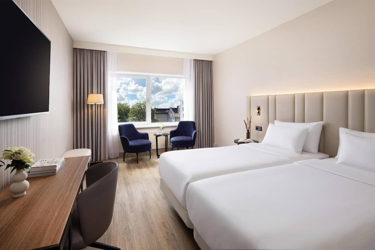 Standard Room (Courtyard) | Minibar, in-room safe, desk, blackout drapes