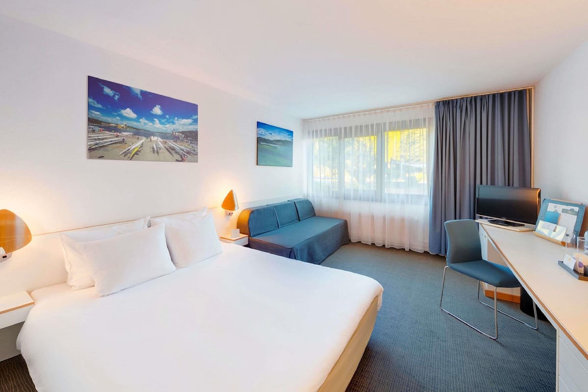 Desk, blackout curtains, free cots/infant beds, free WiFi