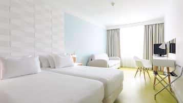 Triple Room | In-room safe, desk, laptop workspace, blackout drapes