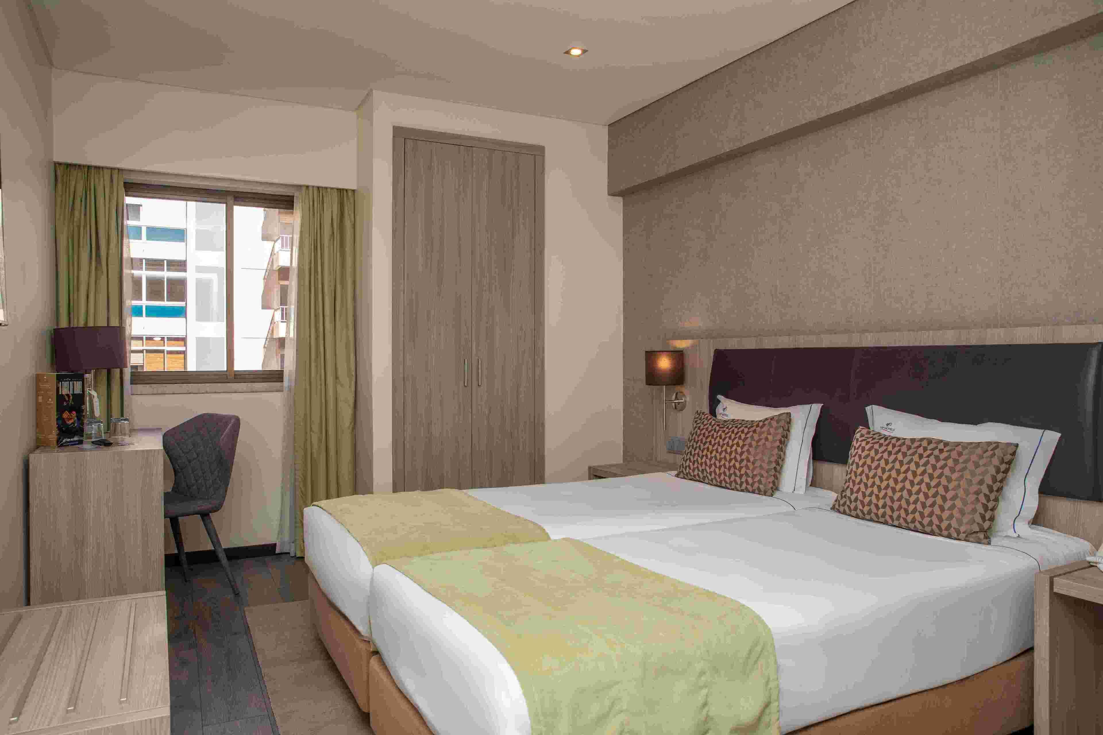 Executive Twin Room | In-room safe, desk, blackout curtains, soundproofing