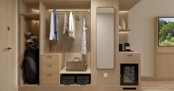 Minibar, coffres-forts dans les chambres, bureau, rideaux occultants