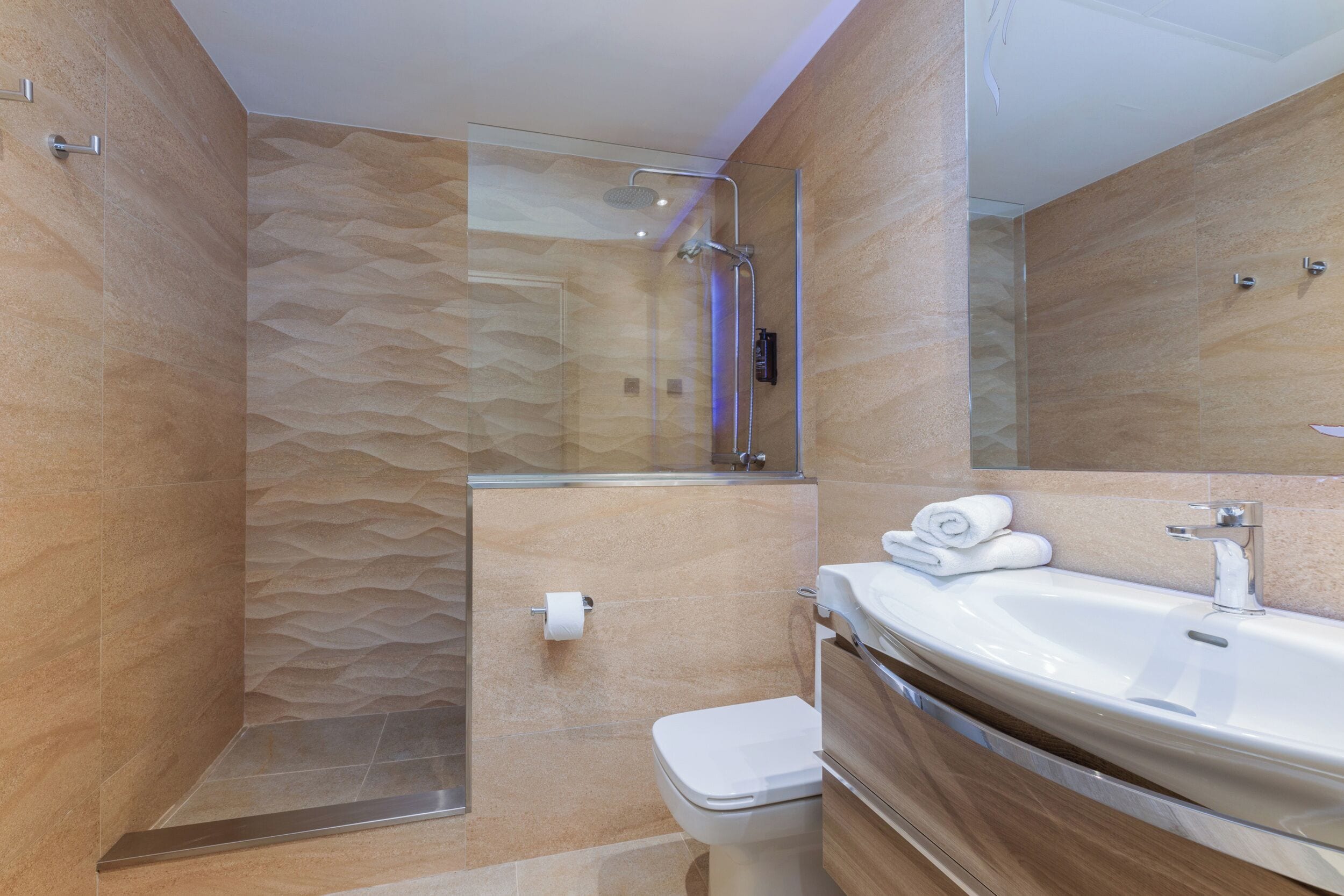 eco-friendly toiletries, hair dryer, towels, soap