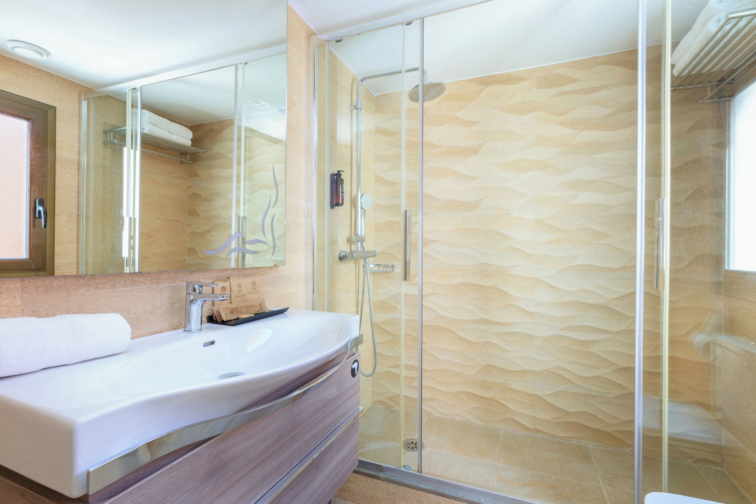 eco-friendly toiletries, hair dryer, towels, soap