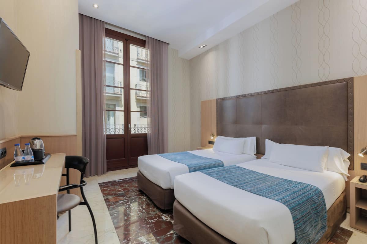1 slaapkamer, donzen dekbedden, een minibar, een kluis op de kamer
