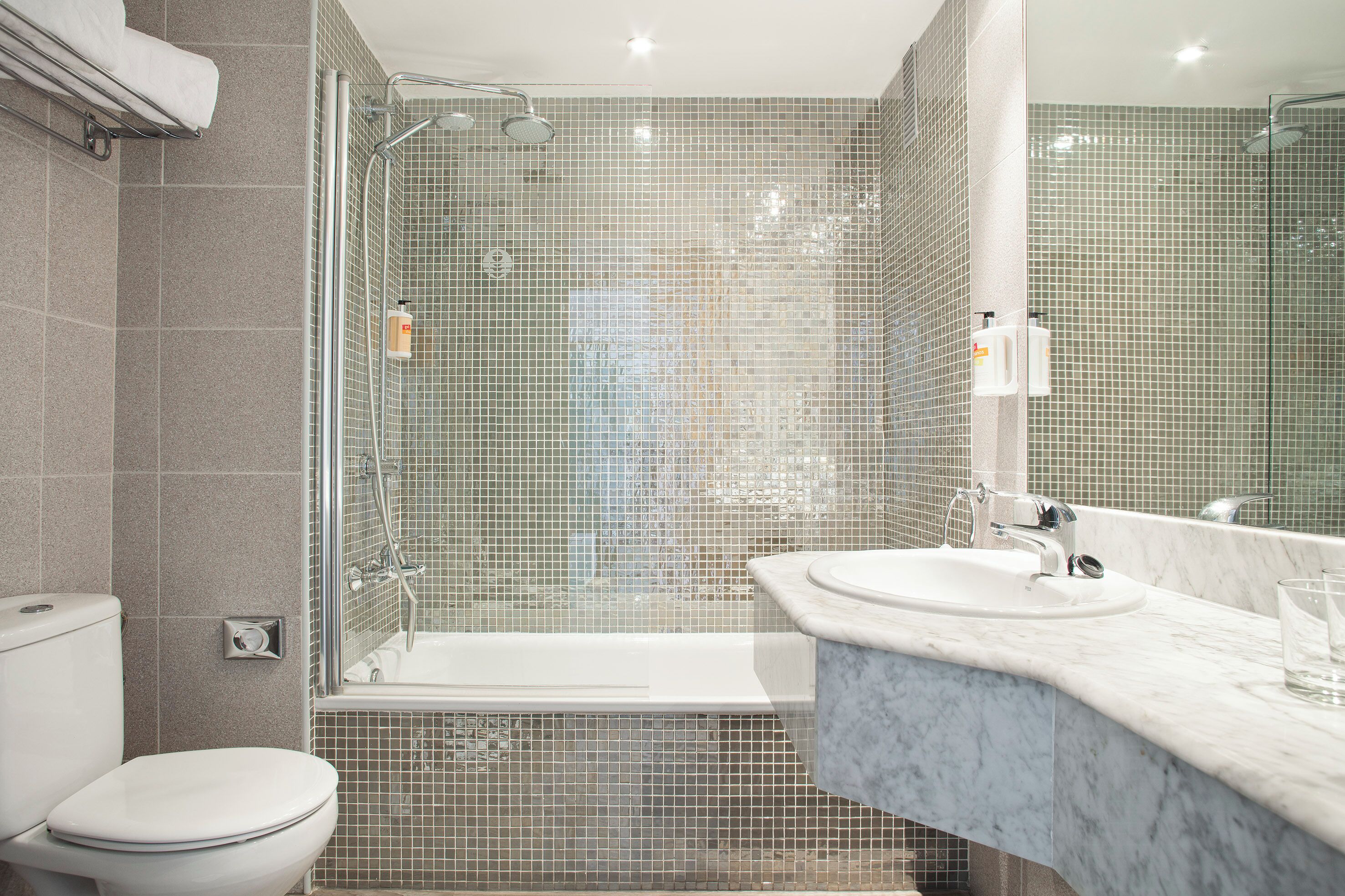 hair dryer, towels, soap, shampoo