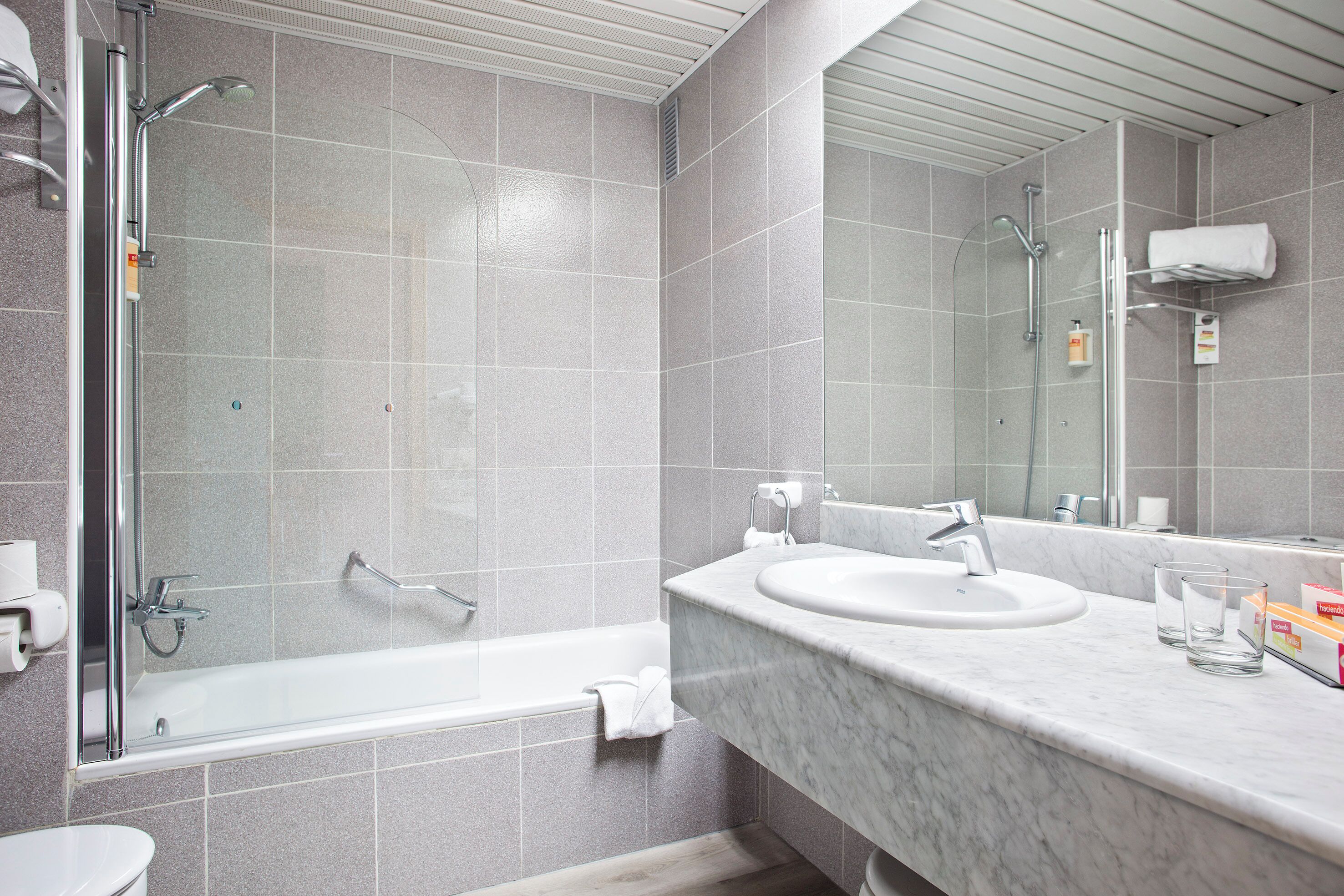 hair dryer, towels, soap, shampoo