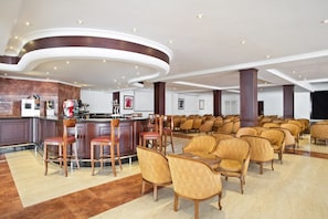 4 bars/lounges, swim-up bar, poolside bar