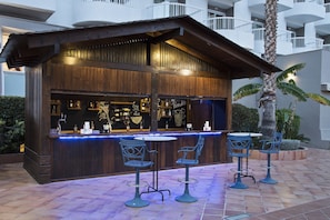 4 bars/lounges, swim-up bar, poolside bar