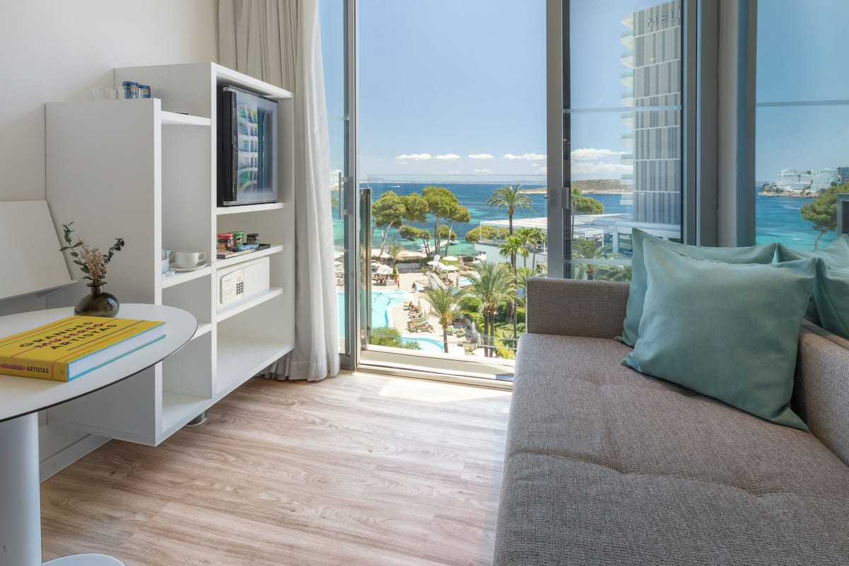 room (melia frontal sea view) | living area | 32-inch flat-screen tv with satellite channels, tv