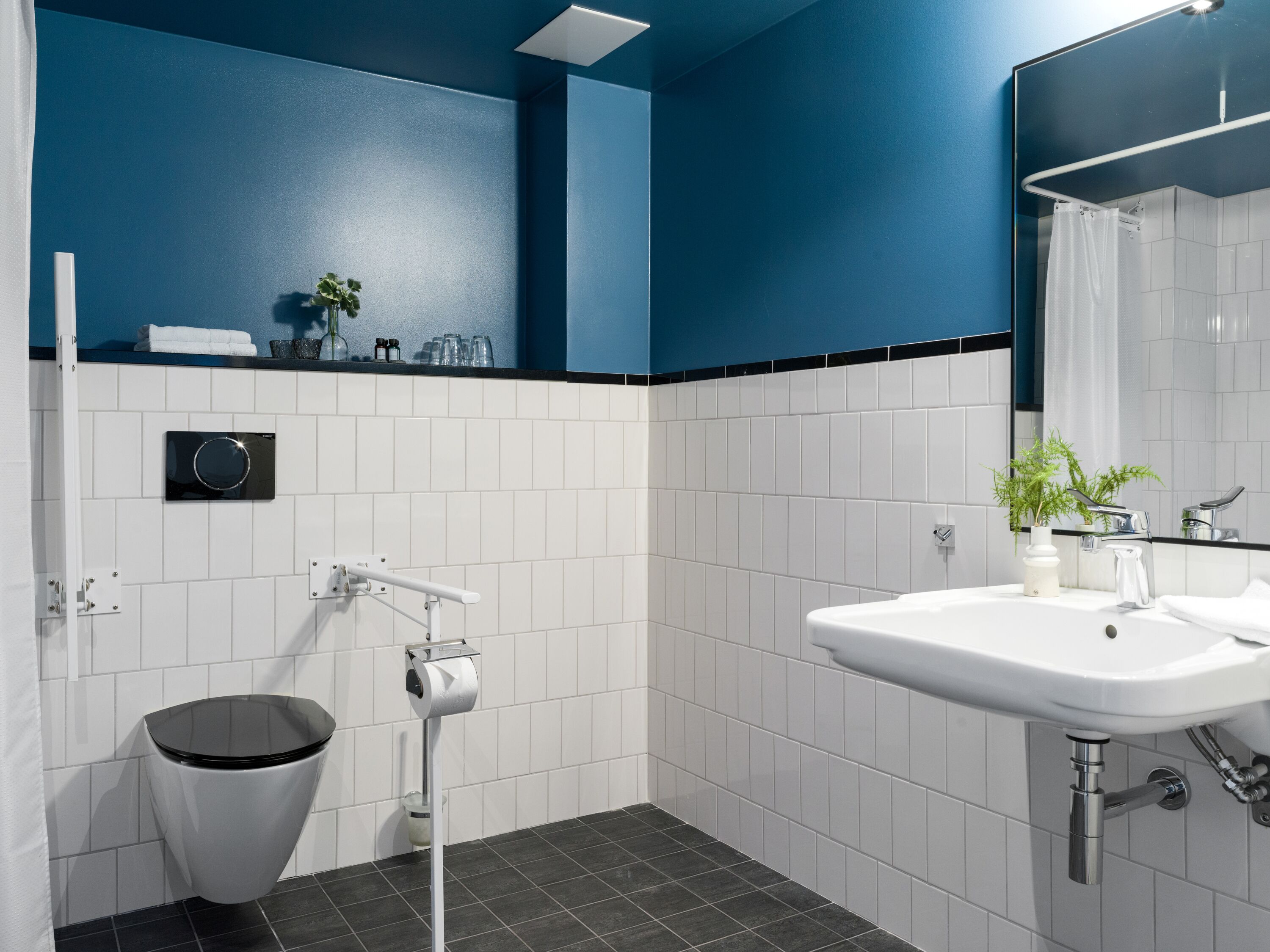 family suite | bathroom | shower, hair dryer, towels