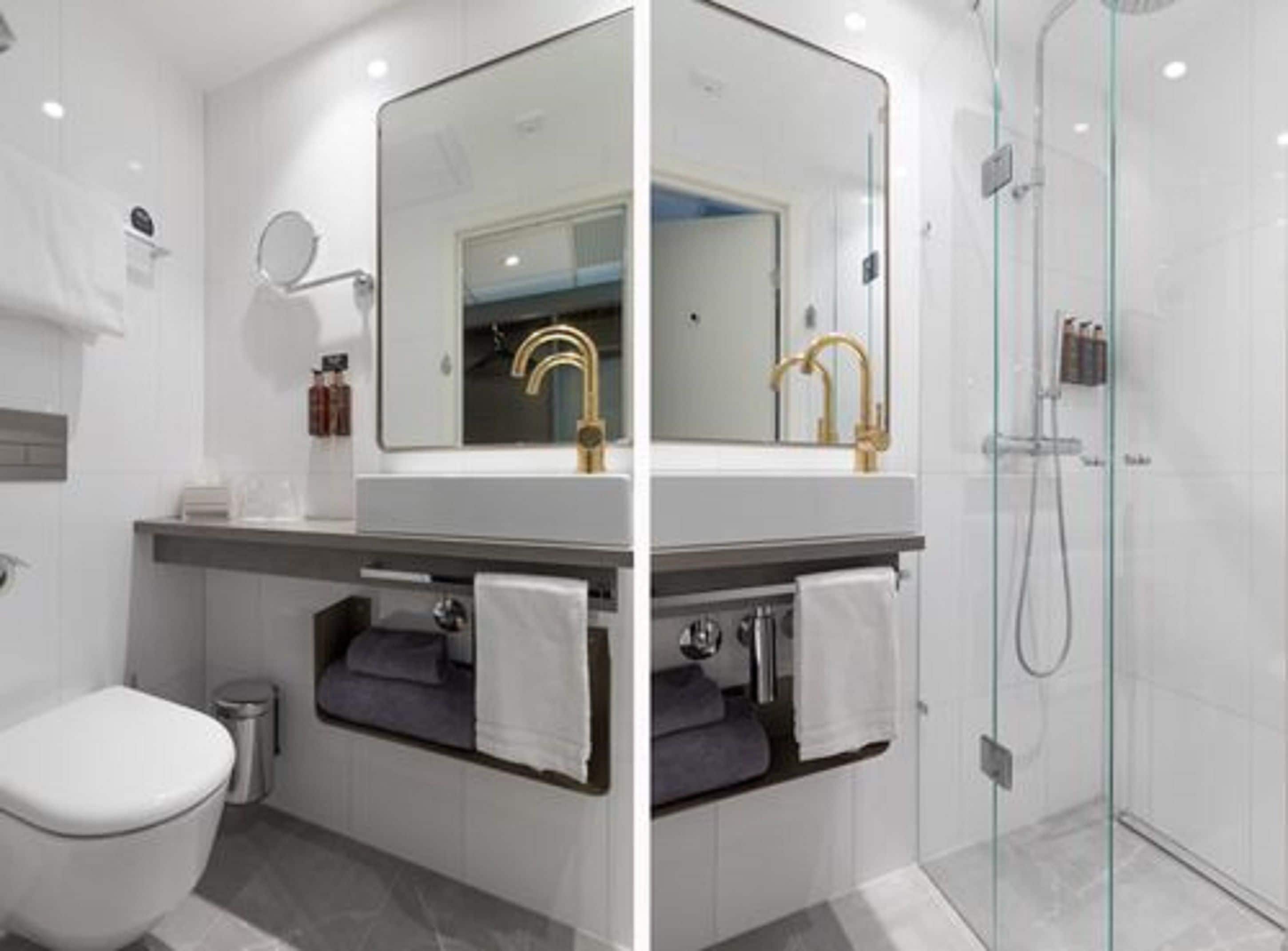 compact double | bathroom | hair dryer, heated floors, towels, soap