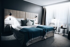 Standard Twin Room, Non Smoking | Desk, iron/ironing board, bed sheets - Clarion Hotel Gillet (Uppsala)