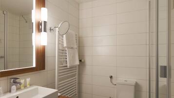 Ein modernes Badezimmer mit großem Spiegel, Waschbecken, Toilette und Duschbereich.