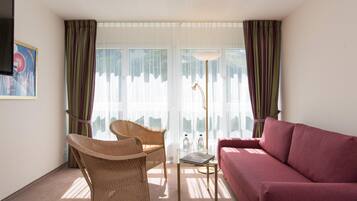 Hypo-allergenic bedding, free minibar, in-room safe, desk