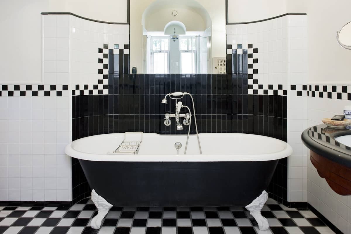 designer toiletries, hair dryer, bathrobes, slippers