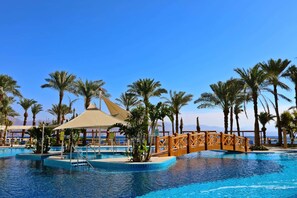 2 outdoor pools, sun loungers