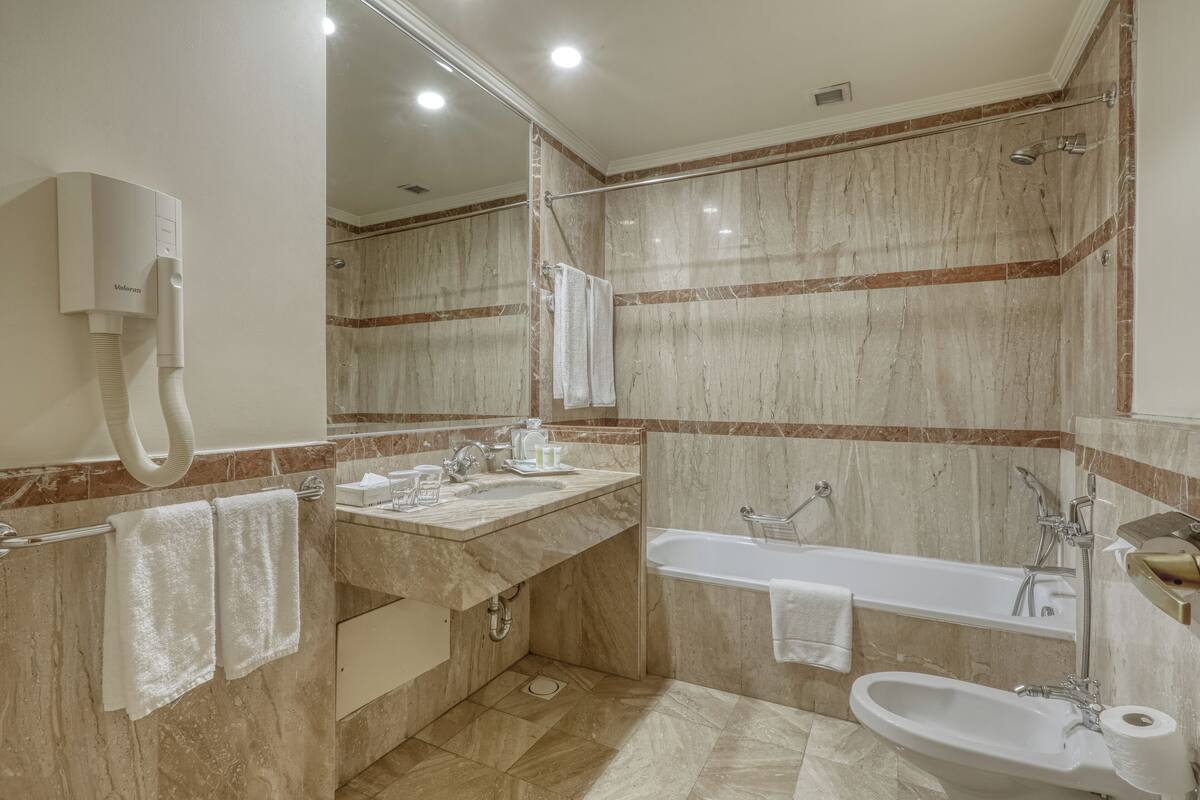 Free toiletries, hair dryer, bidet, towels