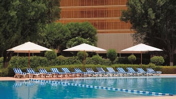 Outdoor pool, pool umbrellas, sun loungers
