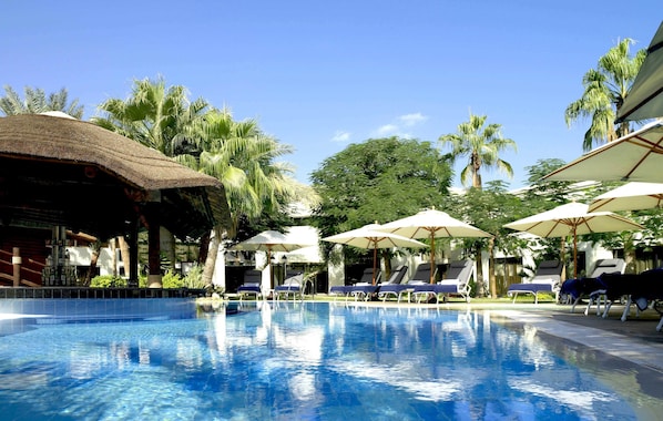 5 outdoor pools, open 5:30 AM to 10:00 PM, pool umbrellas, sun loungers