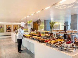 Daily buffet breakfast (USD 31 per person)