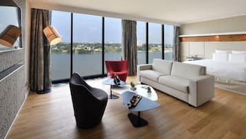 Suite Junior, 1 trÚs grand lit, vue lagon | Literie de qualité supérieure, minibar, coffres-forts dans les chambres