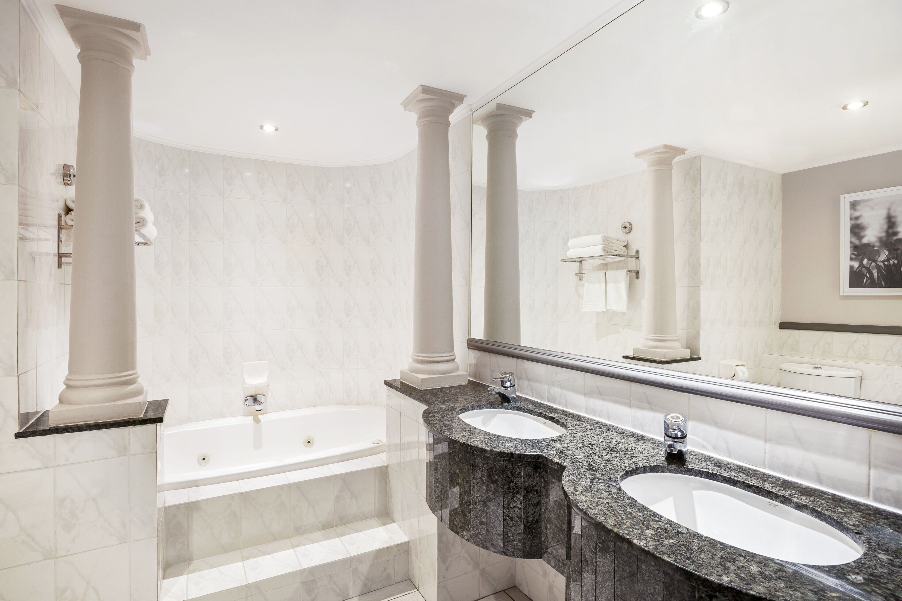 separate bathtub and shower, free toiletries, hair dryer, towels