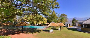 Outdoor pool, free cabanas, pool umbrellas