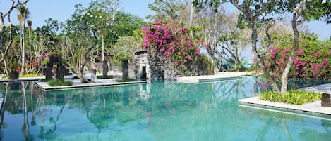 3 outdoor pools, open 8 AM to 7 PM, pool umbrellas, sun loungers