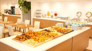 A buffet with various pastries and breakfast items. - Hiroshima Tokyu REI Hotel (Hiroshima)