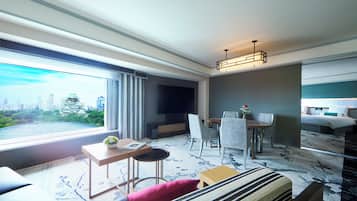 Une chambre d’hôtel moderne avec vue sur la ville, un coin repas et une chambre à coucher séparée.