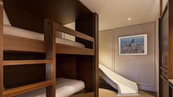 A bunk bed with a white mattress, a wooden ladder, and a white slide.