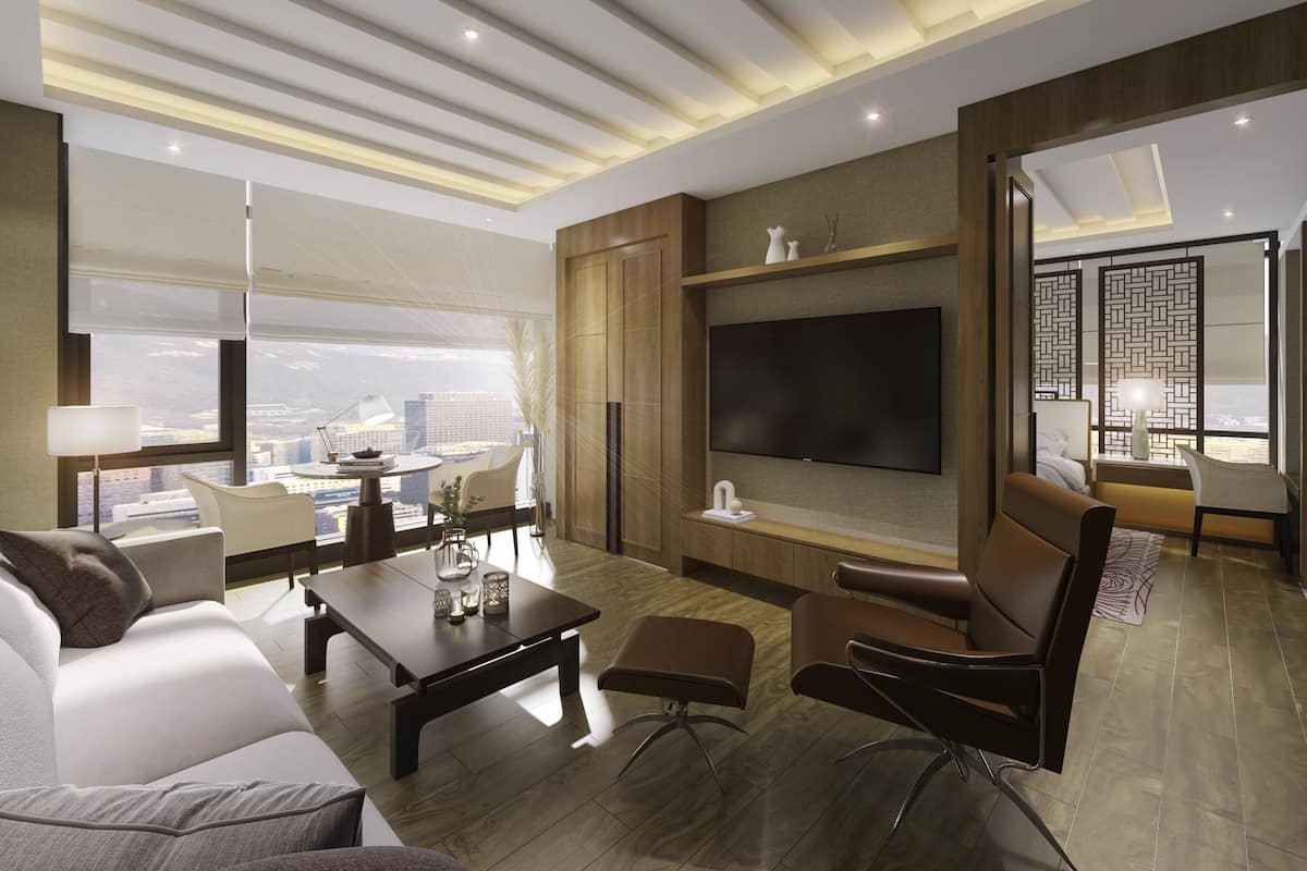 Una sala de estar moderna con un televisor de pantalla plana grande, asientos cómodos, un comedor y vistas a la ciudad.