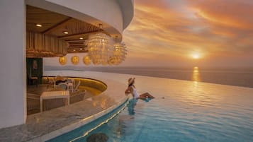 5 bars/lounges, swim-up bar, poolside bar