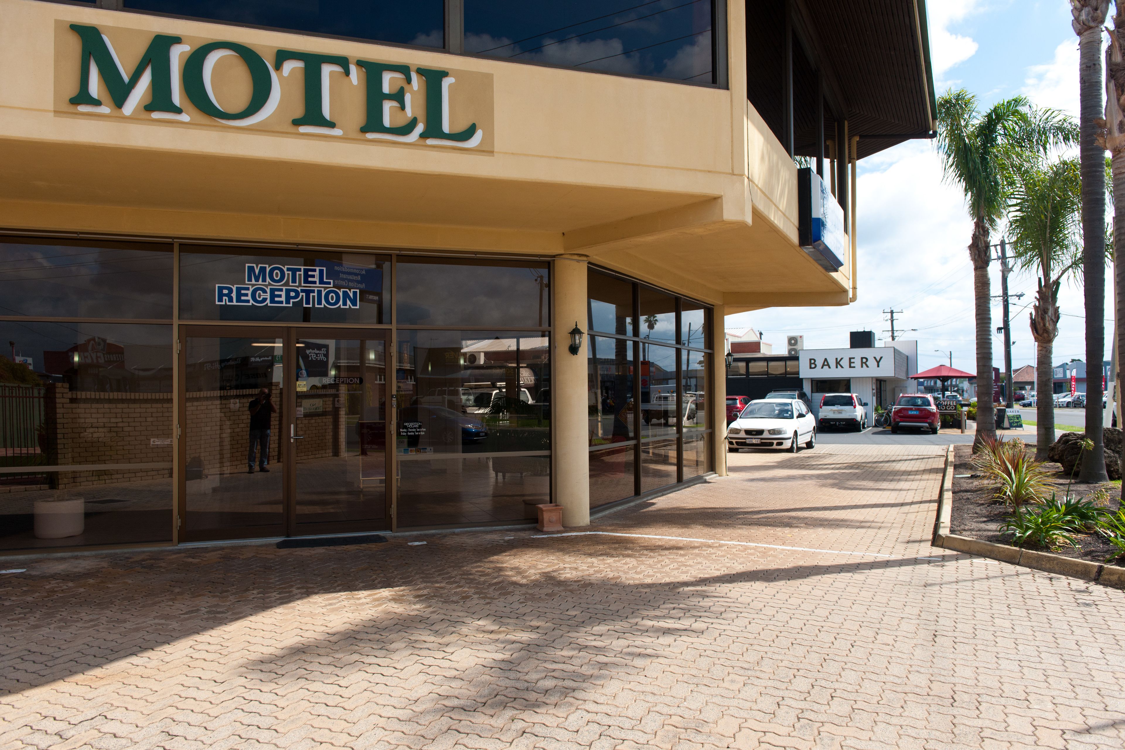 A motel with a reception area and a bakery.