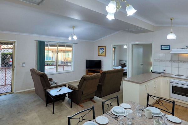 Minibar, desk, laptop workspace, iron/ironing board