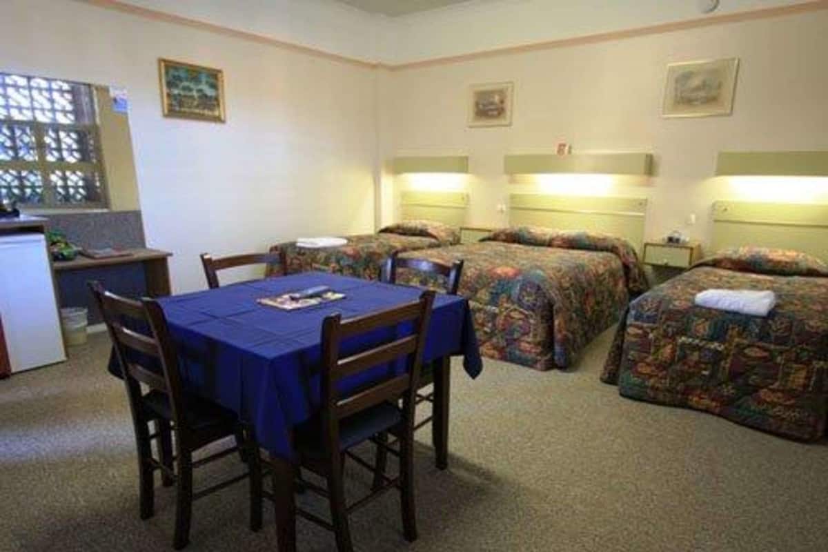 Minibar, desk, laptop workspace, iron/ironing board