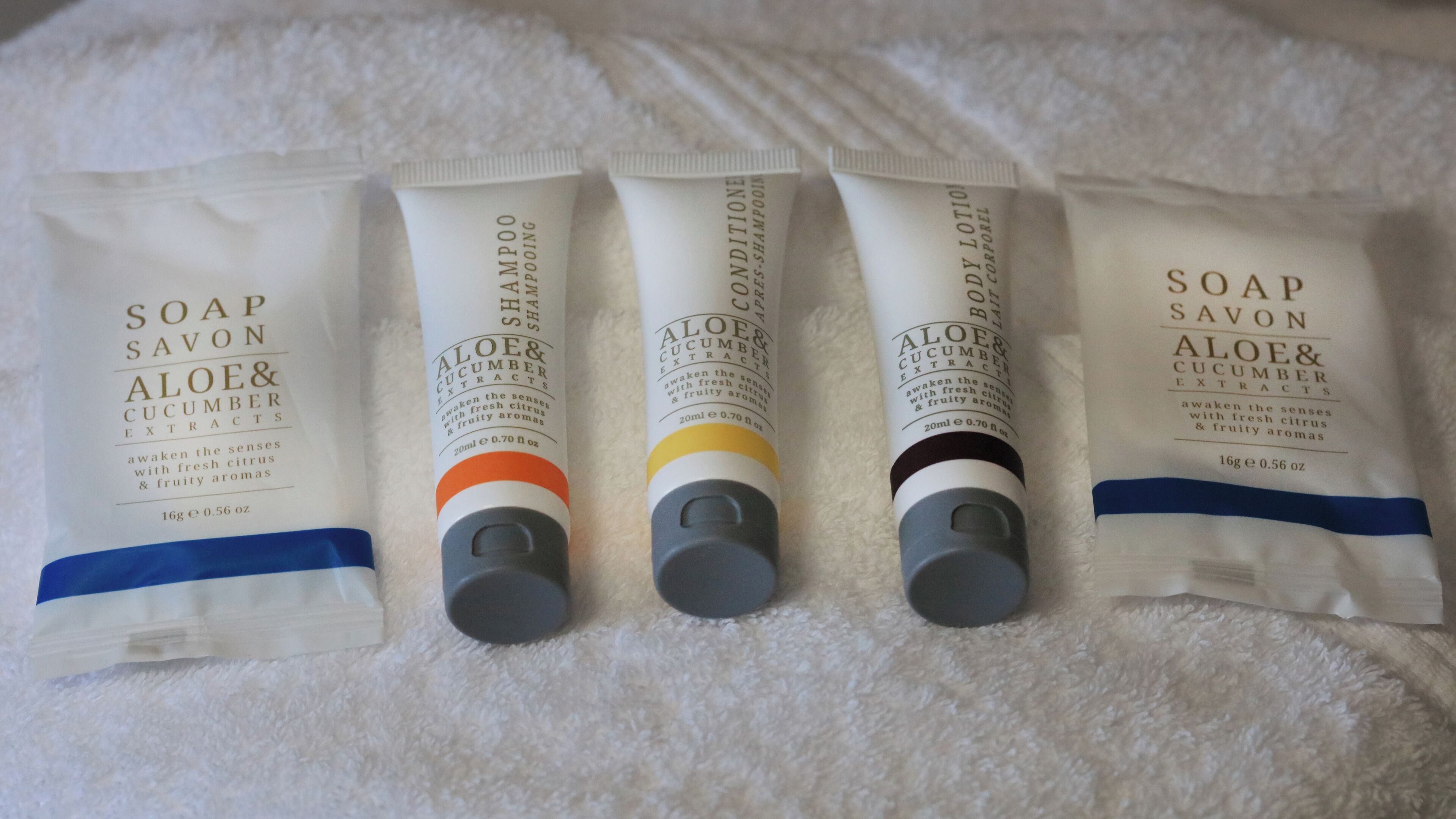 shower, rainfall showerhead, hair dryer, towels