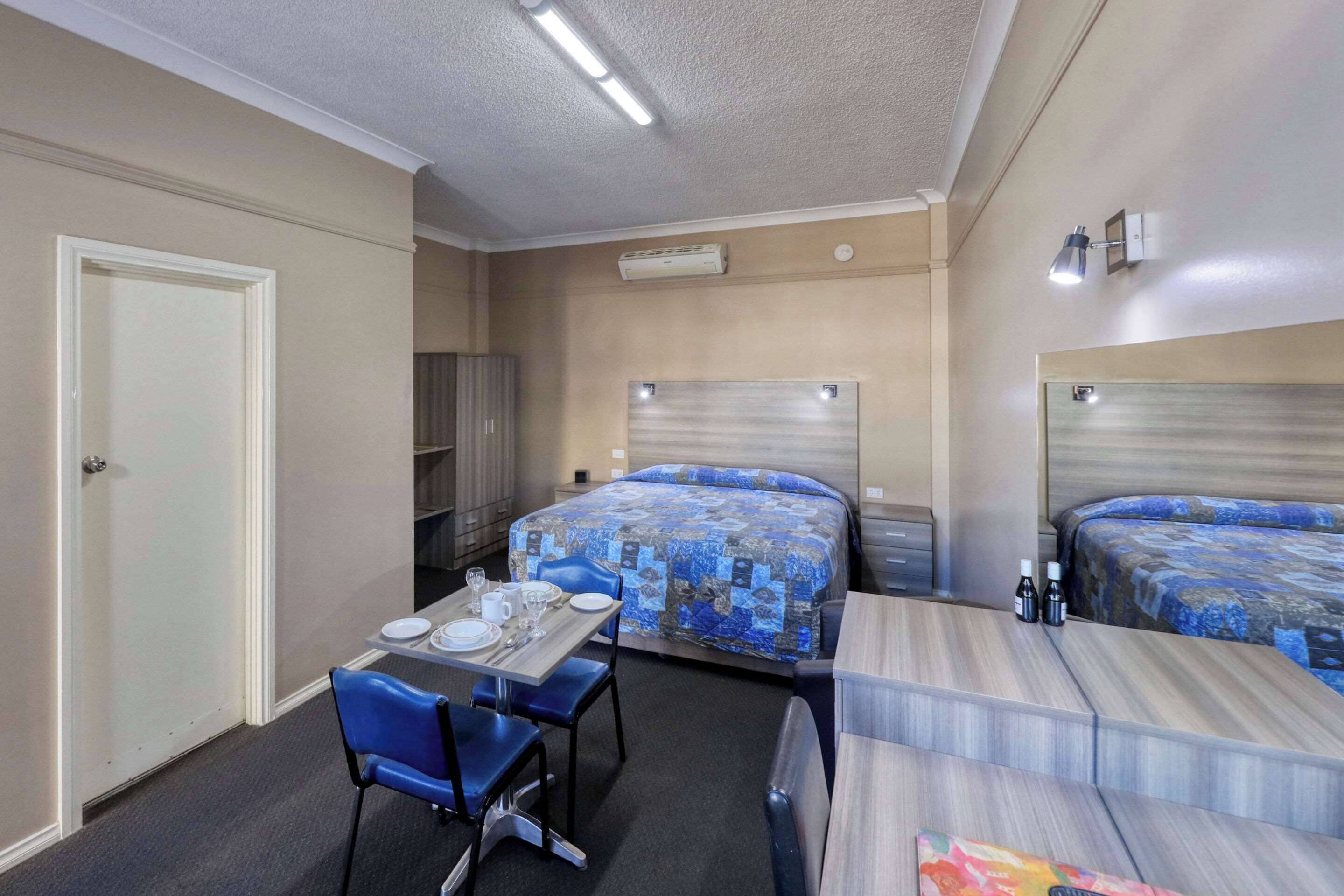 deluxe suite | minibar, desk, laptop workspace, iron/ironing board