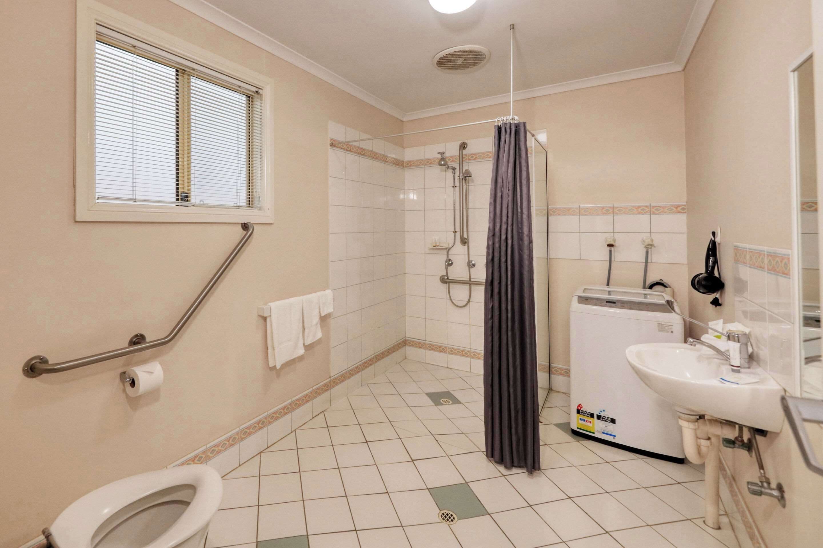 suite, multiple beds, non smoking | minibar, desk, laptop workspace, iron/ironing board